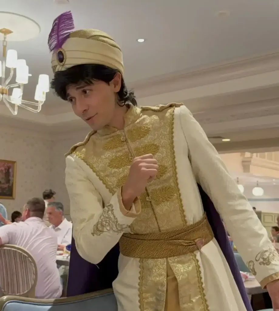 1900 Park Fare Review: Character Dinner at Disney World’s Grand Floridian 4 Prince Ali Aladdin in royal gold costume at 1900 Park Fare character dining in Disney Grand Floridian Resort