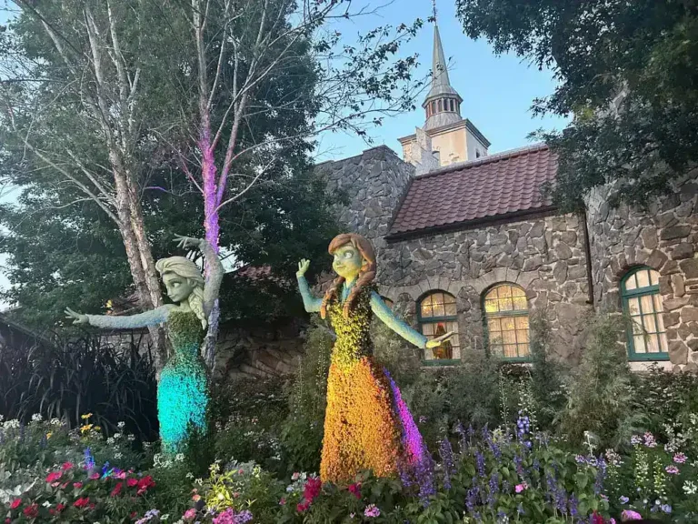 Anna and Elsa Frozen flower topiaries in the Norway pavilion garden at EPCOT Flower and Garden Festival
