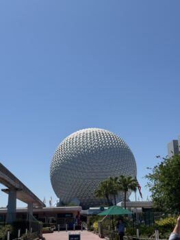 Spaceship Earth at EPCOT under clear blue sky Disney World