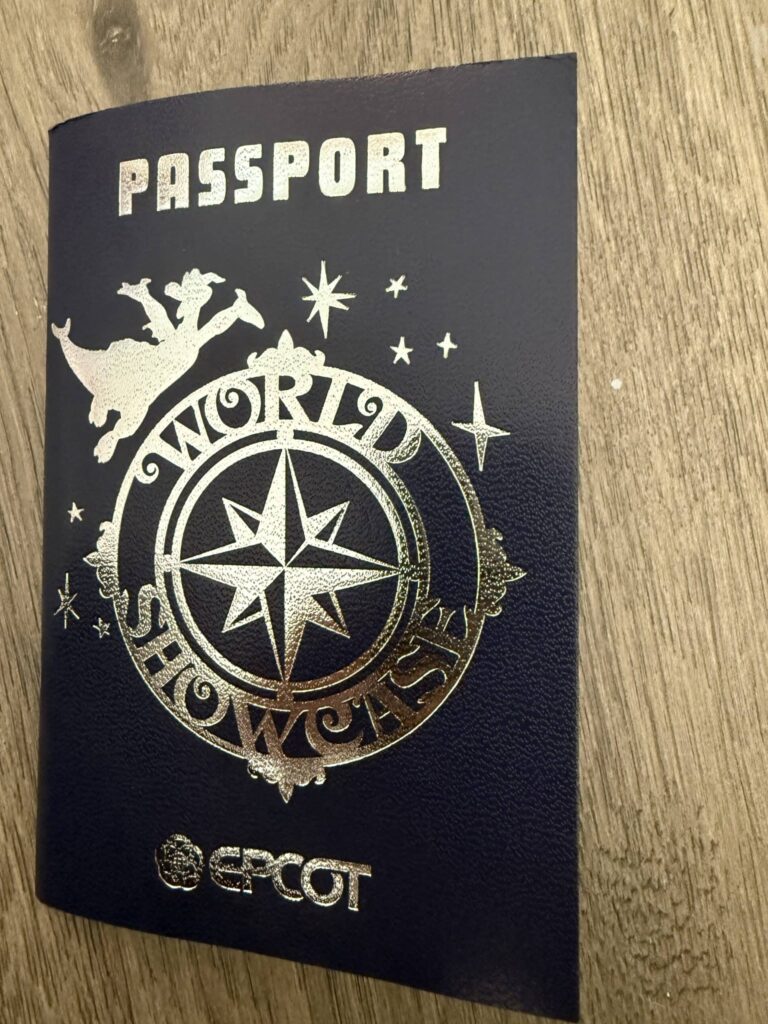 EPCOT Guide: Best Rides, Food & World Showcase Tips 4 EPCOT World Showcase passport booklet used for collecting stamps and signatures from each country pavilion at Disney World.